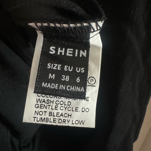 SHEIN romper shorts. NWOT. Size Medium black with tan buttons. - Picture 3 of 4